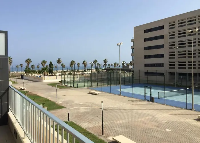 Apartamento Lujo, Primera Linea Playa, Garaje, Wifi, Piscina Climatizada