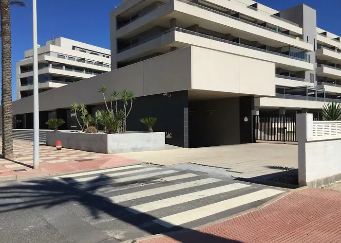 Apartamento Lujo, Primera Linea Playa, Garaje, Wifi, Piscina Climatizada