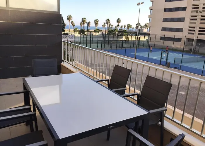 Apartamento Lujo, Primera Linea Playa, Garaje, Wifi, Piscina Climatizada